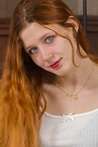 Alice – A Strip Poker Game With a Sensual 21-Year-Old Redhead, Innocent Eyes, and a Cute, Shapely Butt.